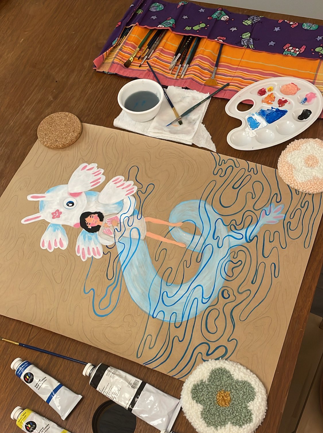 a work in progress painting showing an axylotyl holding a girl in rippling water
